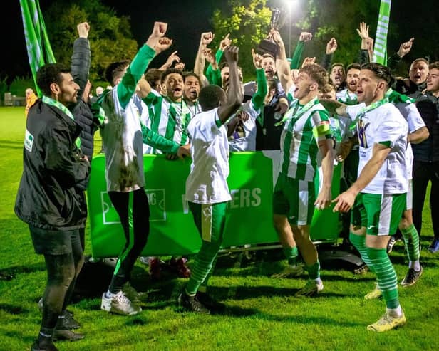 Chichester City lift the promotion play-off trophy | Picture: Neil Holmes