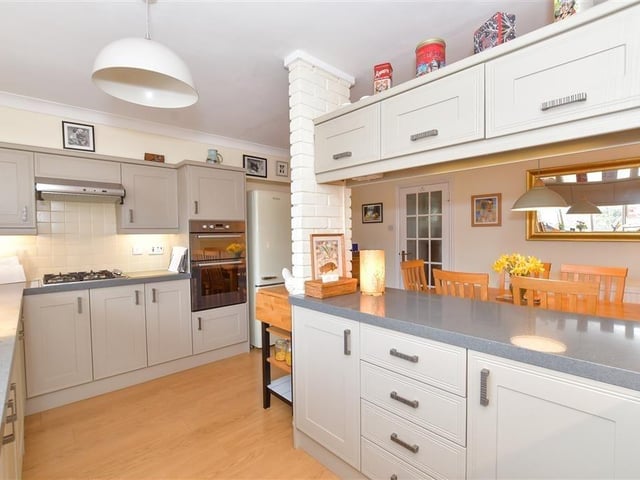 This modern town house with waterside garden is tucked away on a desirable private development in the heart of Arundel. It comes to the market with Cubitt & West, priced at £700,000.
