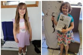 Six-year-old Mia-rose Russell with the hair she had cut for Little Princess Trust to make into a wig