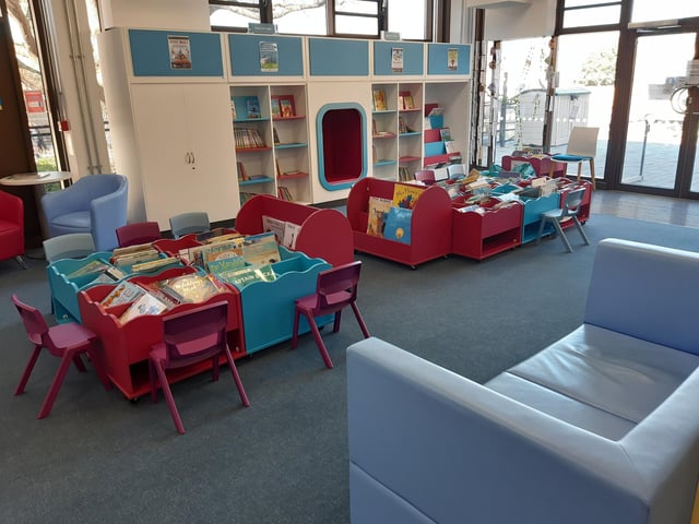 The children's library, with a door leading out to the new garden area