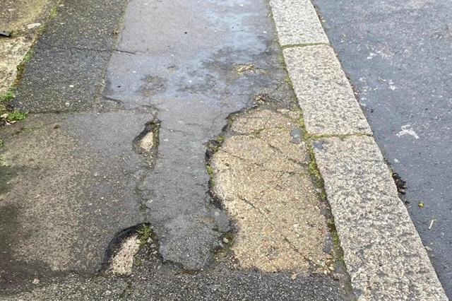 A cracked and dangerous pavement
