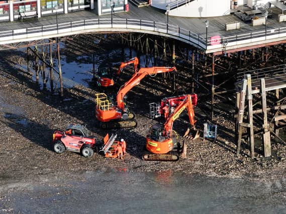 With full repair works unable to start until mid-November, the council is 'having an interim repair done' to help the remaining piles to support the weight of the pier.