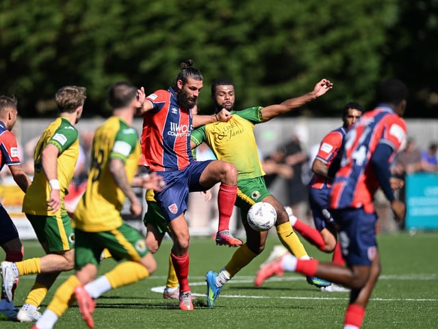 Horsham FC earned a well-deserved point against National League South leaders Dagenham & Redbridge at the Fusion Aviation Community Stadium on Saturday