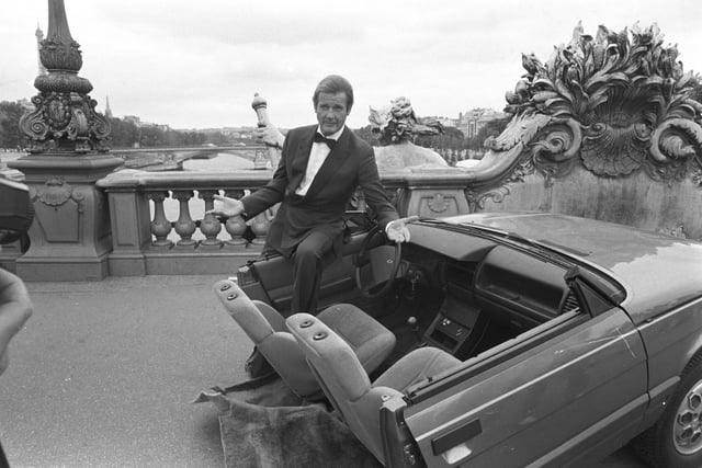 Roger Moore on set in Paris for A View to a Kill in August 1984