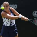 Jodie Burrage of Great Britain plays a backhand with Sonay Kartal of Great Britain against Hailey Baptiste of United States and Peyton Stearns of United States in the Women's Doubles First Round match on Day One of the Lexus Eastbourne Open at Devonshire Park on June 23, 2025 in Eastbourne, England.  (Photo by Charlie Crowhurst/Getty Images for LTA)