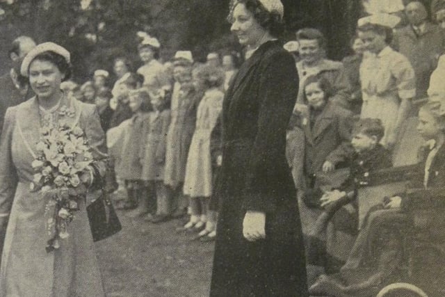 Children from Lancing Heart Hospital with administrative officer Miss B. Tilston, watching Princess Elizabeth during her inspection of hospital contingents at Courtlands Recovery Hospital in Worthing
