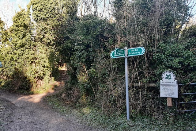 Eventually you reach a junction of various footpaths and the National Trust sign for Highdown Hill.
