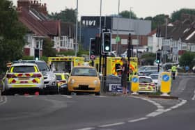 Ambulances and police cars in a cordoned off area on Old Shoreham Road in Hove on Tuesday evening, July 19