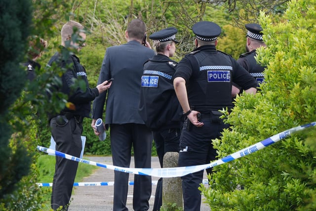 Photos show police cars, officers and a cordoned off area in Bewbush, Crawley, this afternoon (Saturday, April 15)