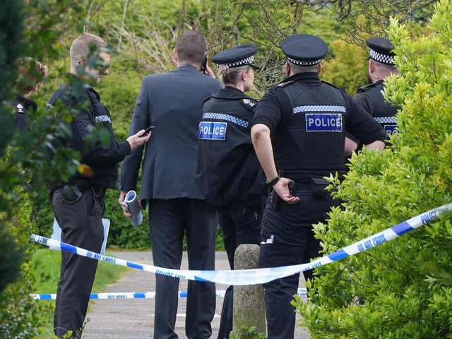 Photos show police cars, officers and a cordoned off area in Bewbush, Crawley, this afternoon (Saturday, April 15)