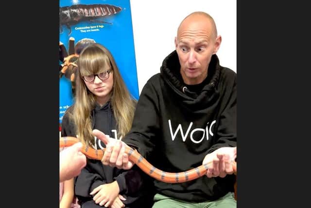 East Sussex charity founder faces his phobia of snakes (photo from Drusillas)