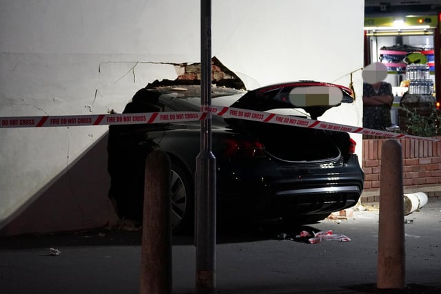 Three people injured after car crashes into wall of house in Eastbourne ...