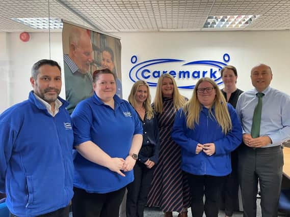 -	Photographs – credit: Office of Andrew Griffith – Andrew with Alfonso, Sarah, Karen Beach, Development Manager, Sue-Ellen Streeter, Registered Care Manager, Lisa Fyfe, co-CEO, Lucianna Shorter, Compliance Manager, at the Caremark offices in Pulborough.