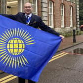 The flag at Horsham District Council's offices at Park House was raised by council vice chairman Nigel Emery to mark Commonwealth Day
