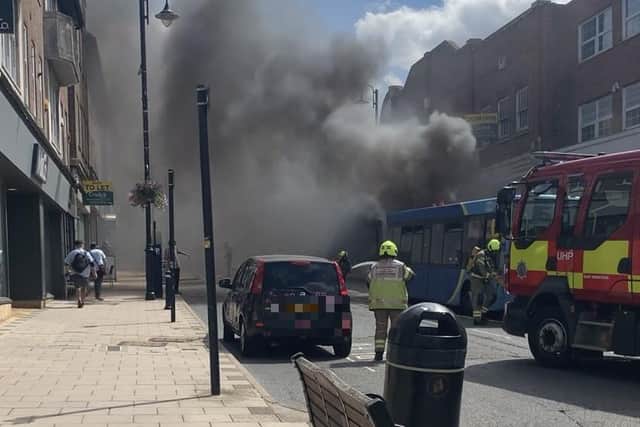 West Sussex Fire & Rescue Service said they were called to a bus fire in East Grinstead at 2.15pm on Thursday, August 4. Pictures by Annie Lyons