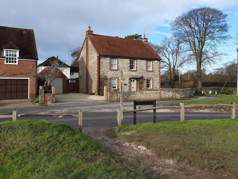 As you leave the green, cross the road to join Steep Lane.