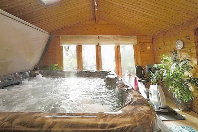 This Ditchling property has an indoor swimming pool, a jacuzzi and a sauna