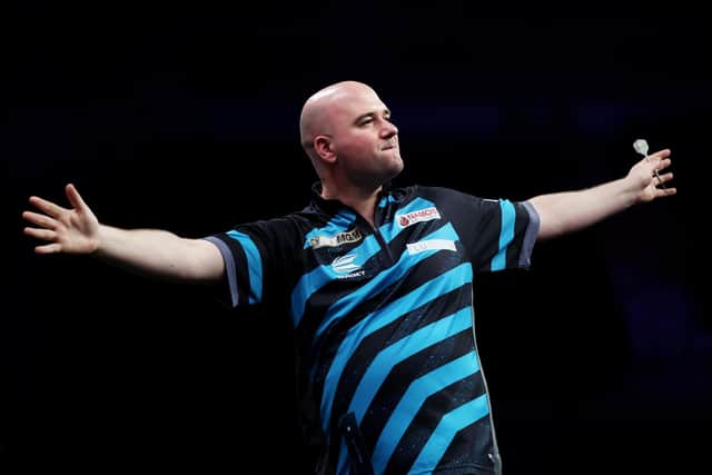 Rob Cross celebrates during a recent BetMGM Premier League event (Photo by Lewis Storey/Getty Images)
