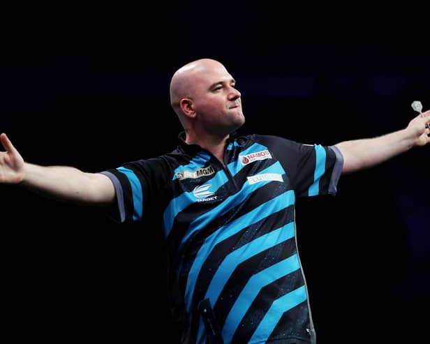 Rob Cross celebrates during a recent BetMGM Premier League event (Photo by Lewis Storey/Getty Images)