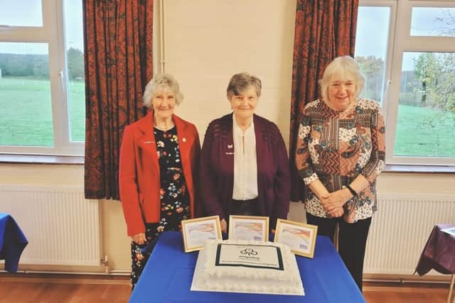 Pat, Gill and Lorrayne with their special cake &amp; certificates
