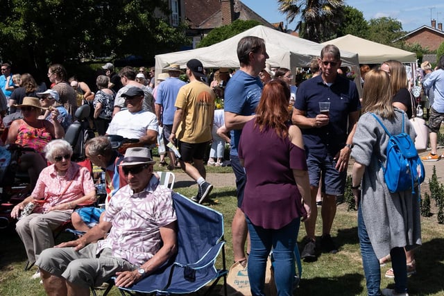 Visitors bask in the sun at the Felpham Village Fete. Photo: Tony Lord