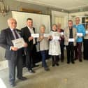 Charity cheques are presented by the Rotary Club of Eastbourne