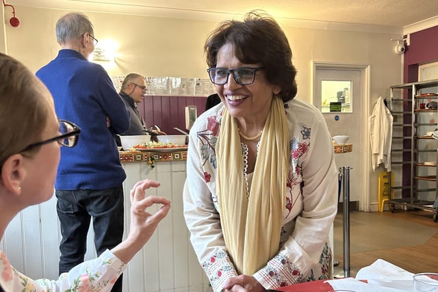 Haywards Heath town mayor Stephanie Inglesfield compliments Daksha on her curry