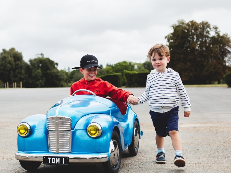 Thomas and George hold hands on his practice. Photo: Johnathan Swan.
