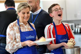 HRH The Duchess of Edinburgh makes scones with a student at Manor Green College during her visit to Crawley. Picture: Steve Robards/SussexWorld