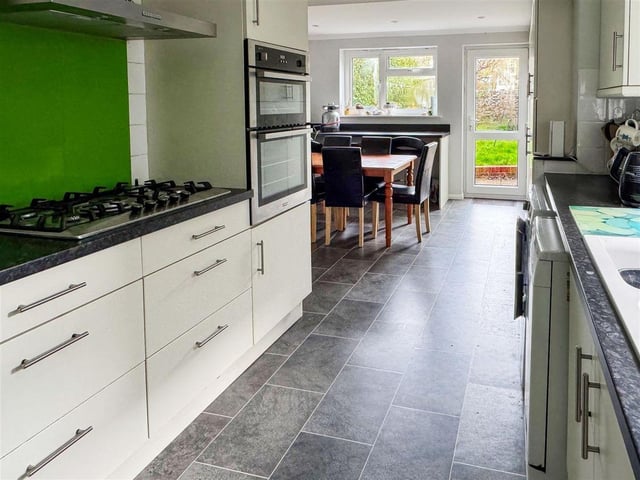 The superb 22ft kitchen with breakfast bar has been newly refitted