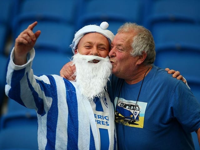 Brighton fans pose for a photo ahead of the Sky Bet Championship match between Brighton and Hove Albion and Middlesbrough at The Amex Stadium on December 19, 2015.