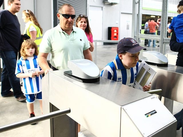 Brighton & Hove Albion supporters enter the new Amex Stadium during the npower Championship match between Brighton & Hove Albion and Blackpool at Amex Stadium on August 20, 2011.