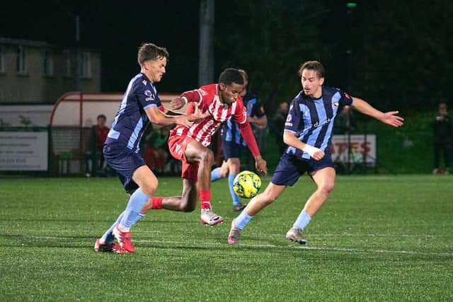 Steyning try to find a way past Crowborough | Picture by Max Spanner