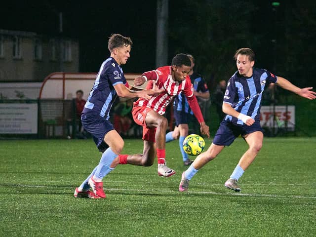 Steyning try to find a way past Crowborough | Picture by Max Spanner
