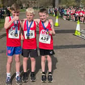 HY Runners' Henry Sully, Benji Pocock and Noah Mayhew at the relays
