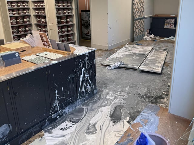 Police officers arrived in their numbers at the Farrow & Ball paint shop, in Western Road, on Wednesday afternoon (October 8).