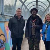 Anthony Kalume of Diversity Lewes, with councillors Adrian Ross and Wendy Maples on the soon-to-be-refurbished footbridge