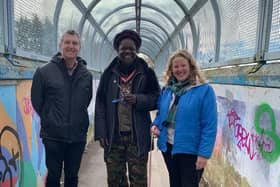 Anthony Kalume of Diversity Lewes, with councillors Adrian Ross and Wendy Maples on the soon-to-be-refurbished footbridge