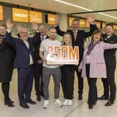 EasyJet passengers Richard Hansen and Amy Lovegrove celebrate being the 250 millionth passengers at Gatwick airport today. From left: Louise Clancy, Aaron Byrne, Hugh McConnellogue, easyJet head of Gatwick, winners Richard Hansen and Amy Lovegrove with Mark Johnston, chief operating officer of Gatwick, Alison Gayward, easyJet UK country manager, and Matt Dipper.