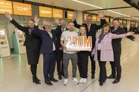 EasyJet passengers Richard Hansen and Amy Lovegrove celebrate being the 250 millionth passengers at Gatwick airport today. From left: Louise Clancy, Aaron Byrne, Hugh McConnellogue, easyJet head of Gatwick, winners Richard Hansen and Amy Lovegrove with Mark Johnston, chief operating officer of Gatwick, Alison Gayward, easyJet UK country manager, and Matt Dipper.