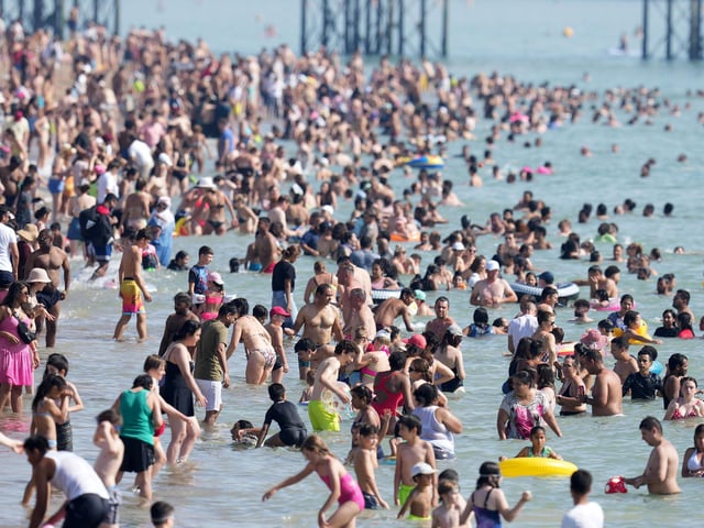 Thousands of people flocked to Brighton beach today (September 9) as temperatures reached 32C across parts of the county.