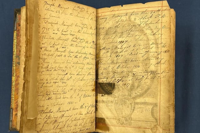 The handwritten inscription page details the births of one of the owner's children.