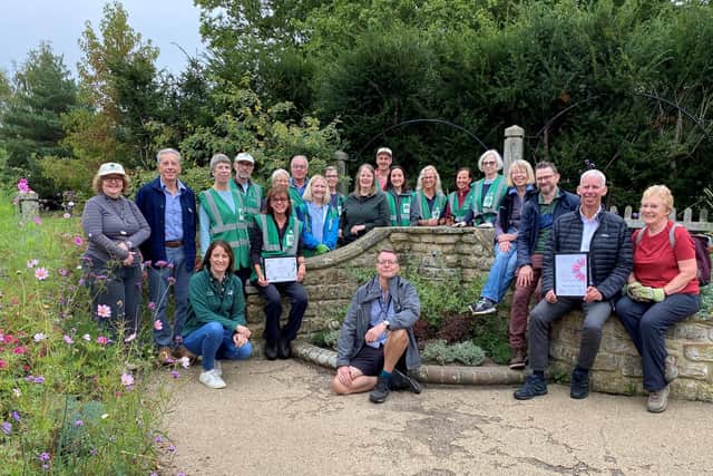 Friends of Horsham Park and officers from the Horsham District Council Parks and Countryside team celebrate the 'In Bloom' award wins with council deputy leader John Milne  and cabinet member for leisure Jon Olson in Horsham Park's sensory garden. Photo contributed