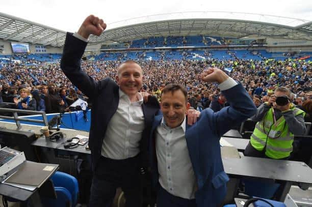 Brighton chief executive Paul Barber, pictured with chairman Tony Bloom (right) after Albion secured promotion to the Premier League in 2017, has signed a new long-term contract at the club. Picture by Mike Hewitt/Getty Images