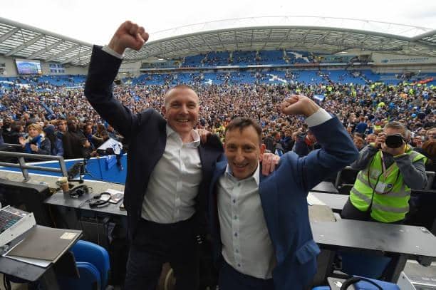 Brighton chief executive Paul Barber, pictured with chairman Tony Bloom (right) after Albion secured promotion to the Premier League in 2017, has signed a new long-term contract at the club. Picture by Mike Hewitt/Getty Images
