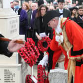Lionel Harman laying a wreath at Worthing's war memorial on Remembrance Sunday in 2021. Picture: Derek Martin/Sussex World