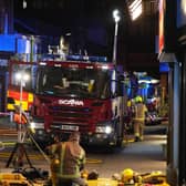 Firefighters on the scene of a blaze at a mobile phone shop in West Street, Horsham