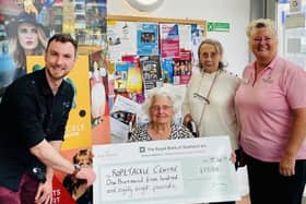 Residents happy to present cheque 