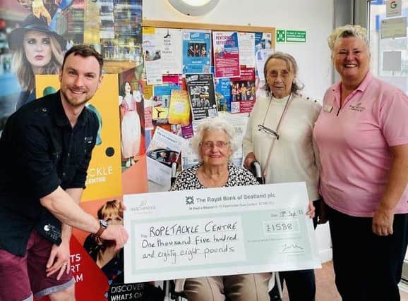 Residents happy to present cheque 