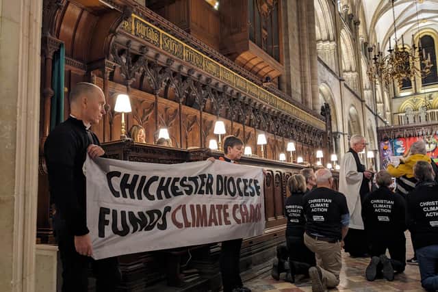 Climate protestors interrupted an evensong service in Chichester Cathedral yesterday